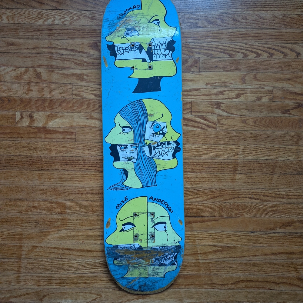 Blue Skateboard Deck with Graphic Design